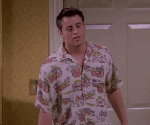 This is a GIF of Joey, a character from the TV series Friends, wearing a shirt with a floral pattern.