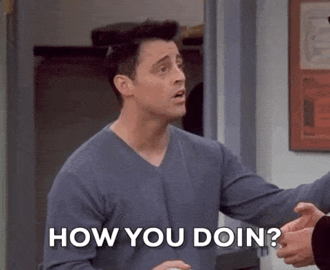 Two men engaged in conversation, one character named Joey from the TV series "Friends" saying "how you doing?" in a GIF.